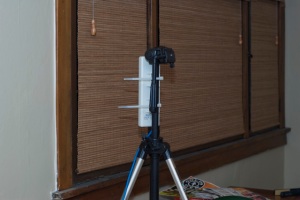 Mounts with zip ties.  Shown here on my camera tripod as a temporary measure during testing.